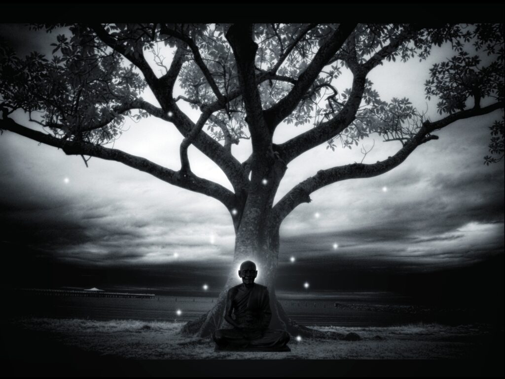A meditator sitting cross-legged in a quiet room, hands resting in the lap